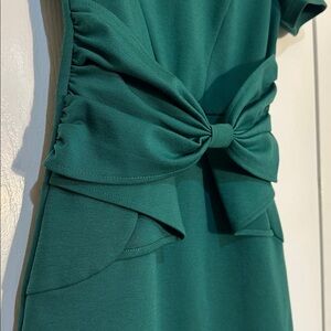 Classy green business dress. Perfect for so many occasions. Bow accent. Size XS